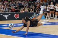 Rodriguez diving to save a point for her collegiate team Nebraska during the 2023 NCAA Volleyball Championship finals (Image via: Getty Images)